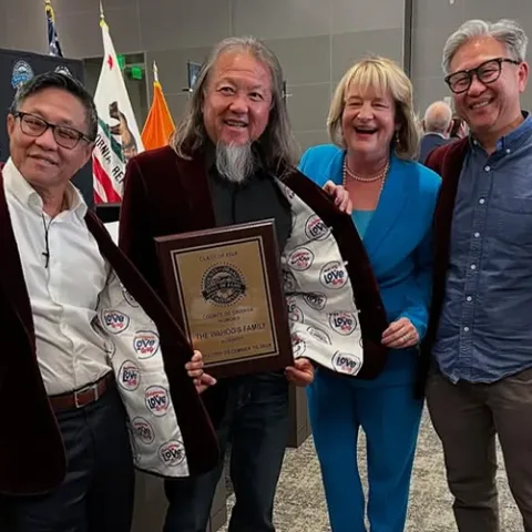 Team members posing for their award