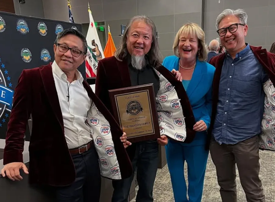 Team members posing for their award